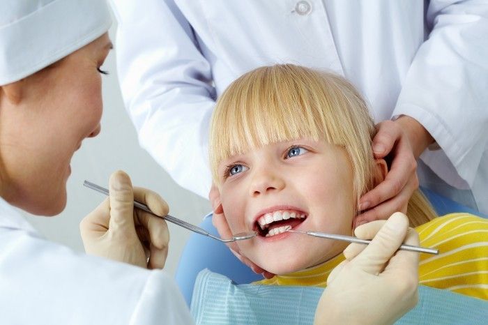 Как удалить зуб ребенку?